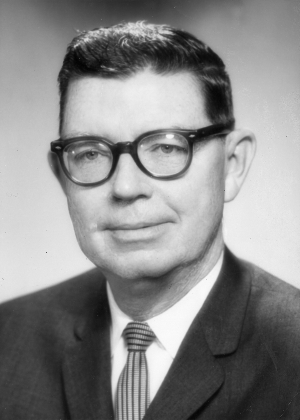 Portrait of Leo Cain, first President of CSC Dominguez Hills. LEo Cain was appointed president of South Bay College in 1962 and guided the establishment of the college through two name changes, 40-plus potential sites, political attempts to shut down the college, and the institution's architectural and curriculum development. He served as president until 1976