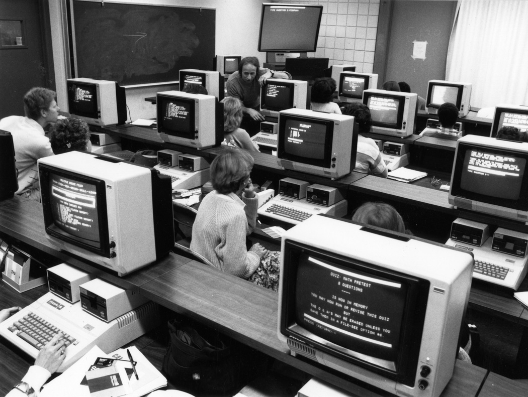 Professor Peter Desberg with students and computers, 1990s
