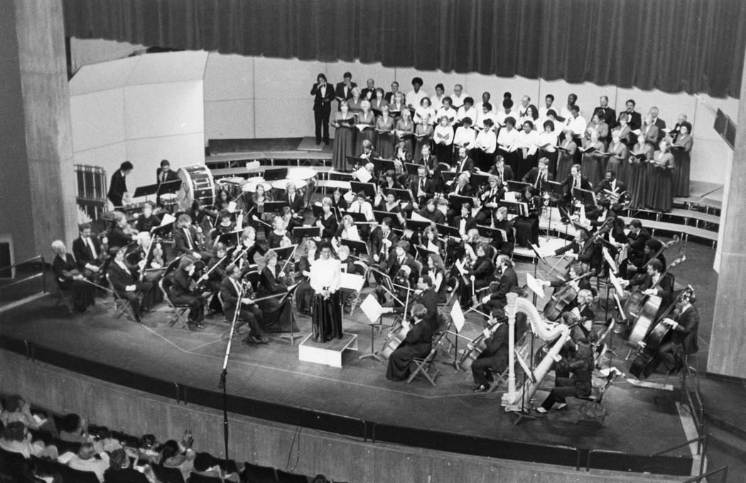 Frances Steiner conducts the annual concert of the Carson-Dominguez Hills Symphony, 1980s
