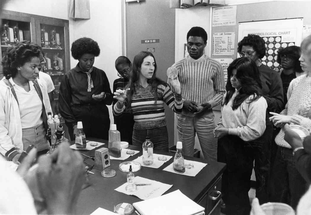 Biology instructor with students in lab, ca. 1970s