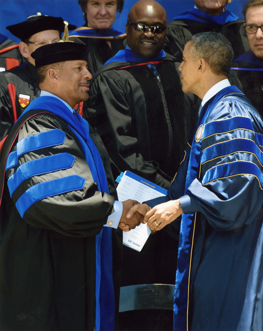 Dr. Thomas Parham with President Barack Obama, UC Irvine commencement, 2014.