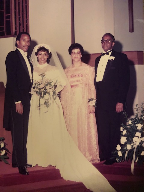 Wedding photo of Thomas A. Parham and Davida Hopkins-Parham with her parents David and Loretta Hopkins, 1985