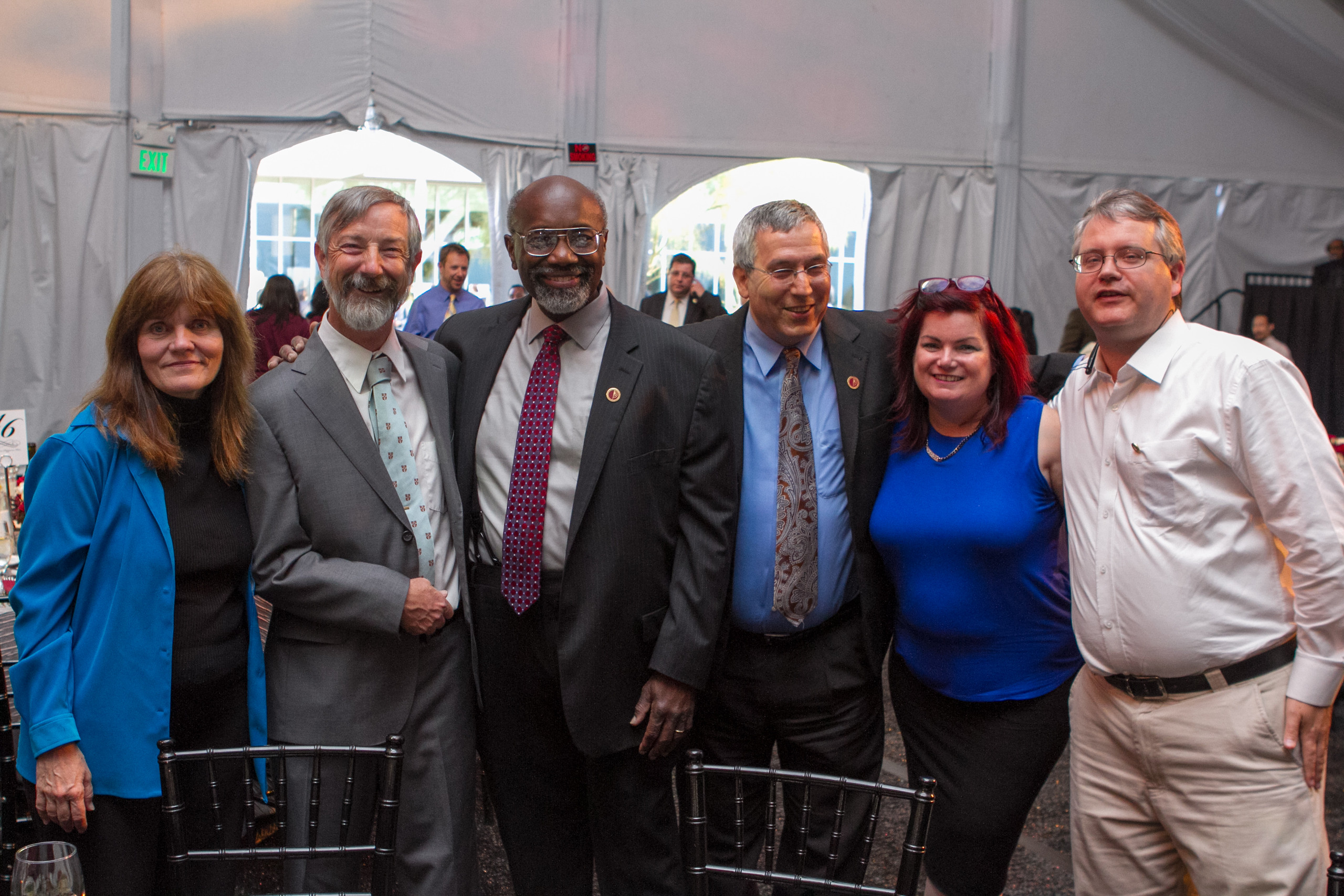 President Willie Hagan with faculty members at the Presidential Dinner, 2014
